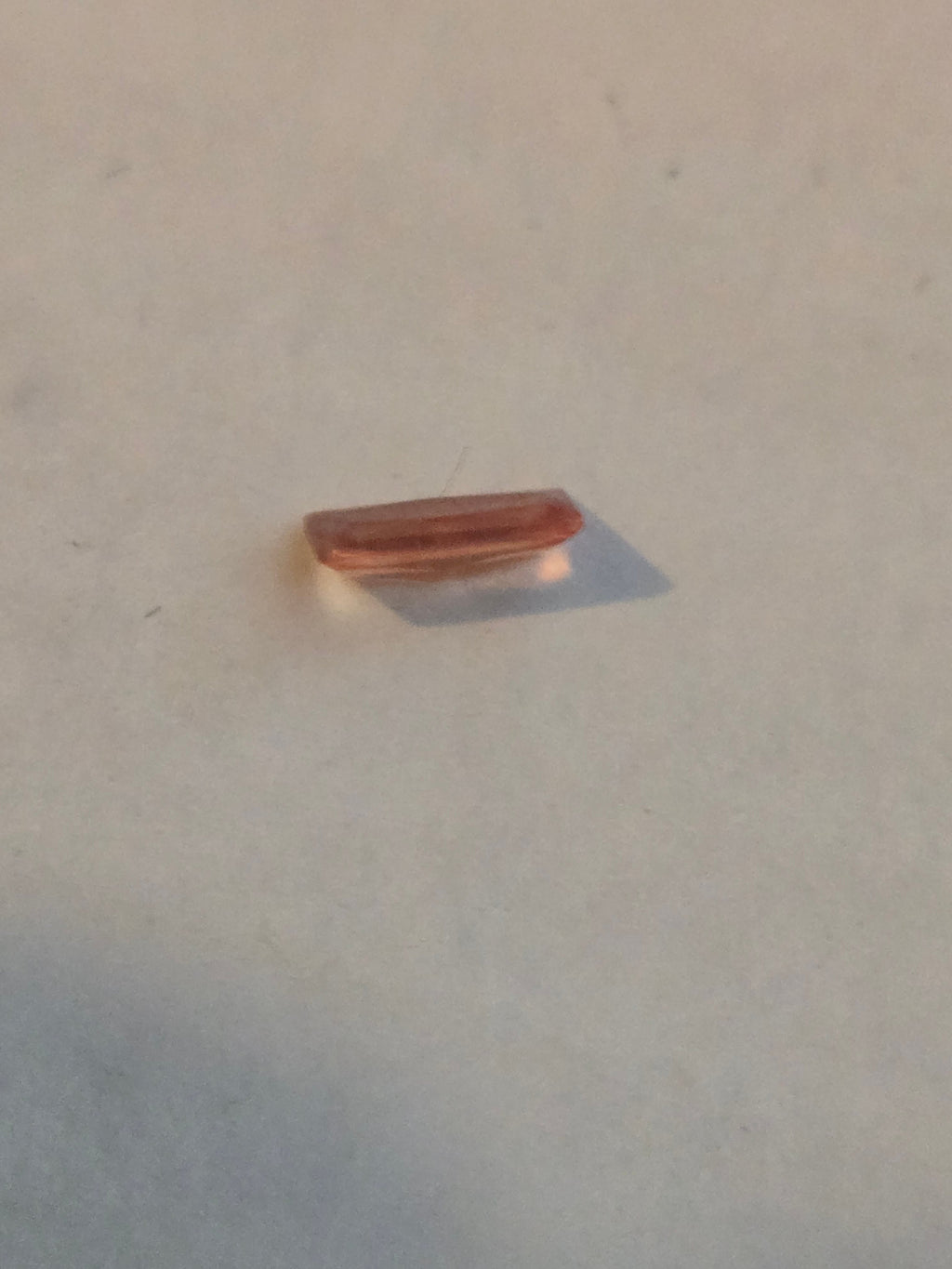 Rhodochrosite facet