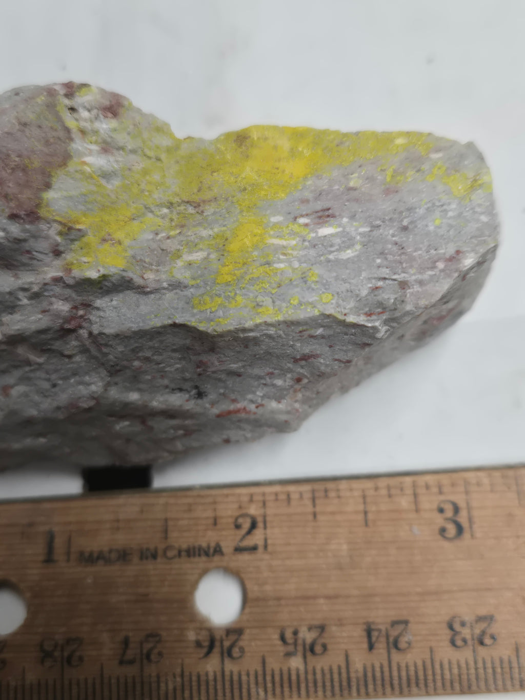 Carnotite weeksite specimen