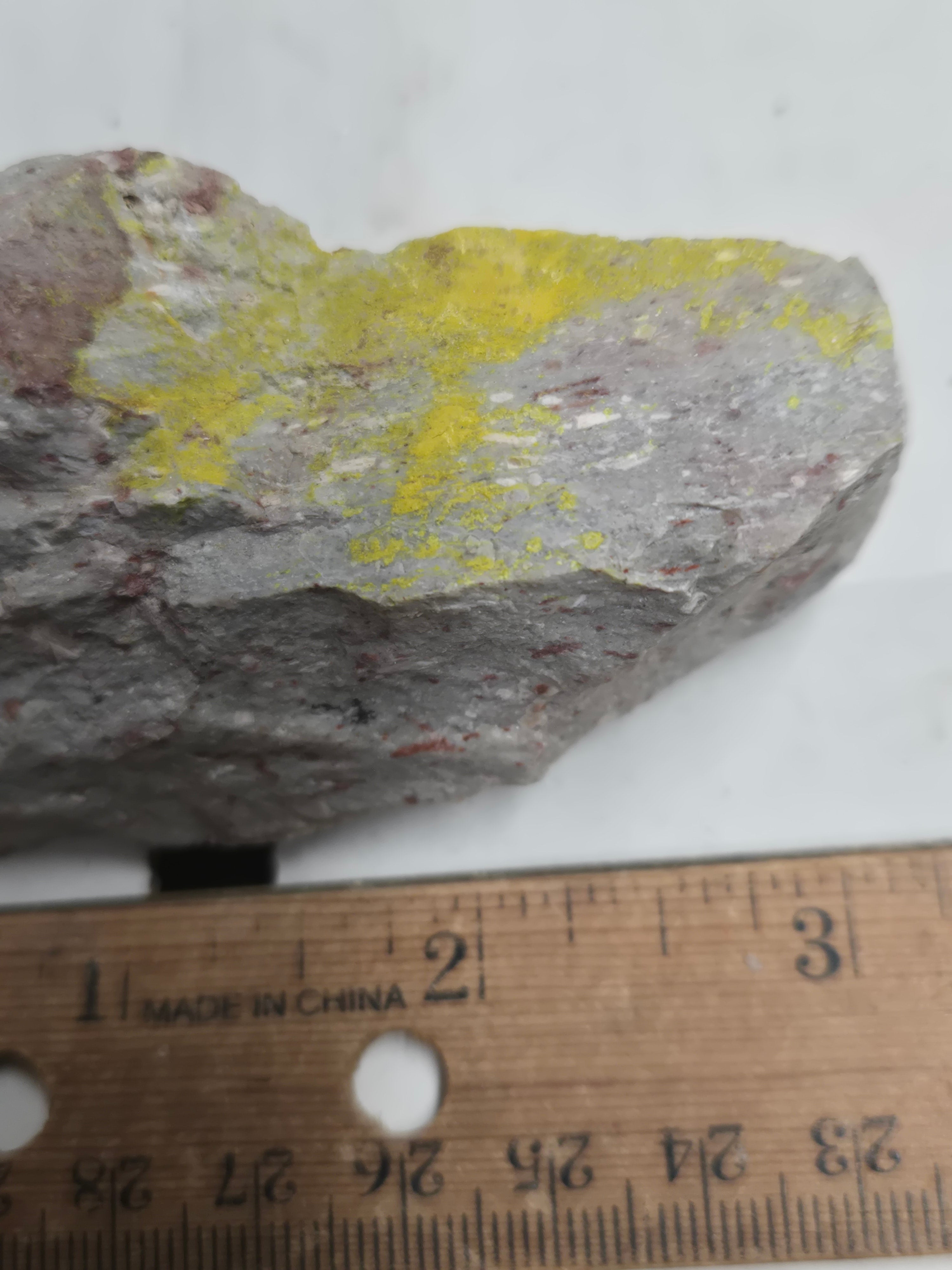 Carnotite weeksite specimen