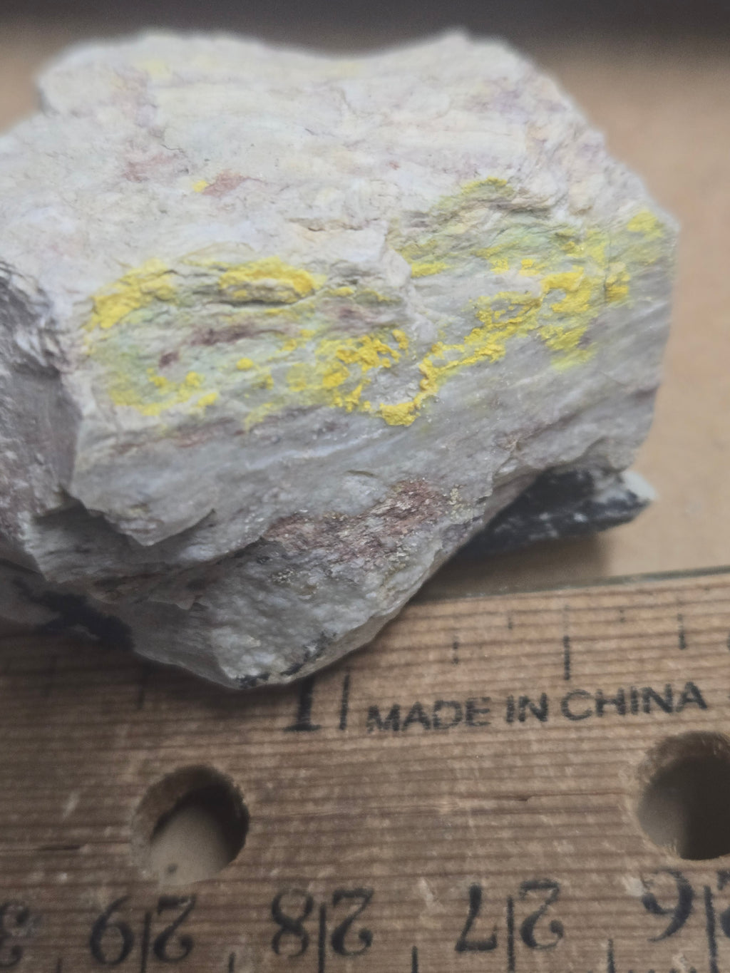 Carnotite weeksite specimen