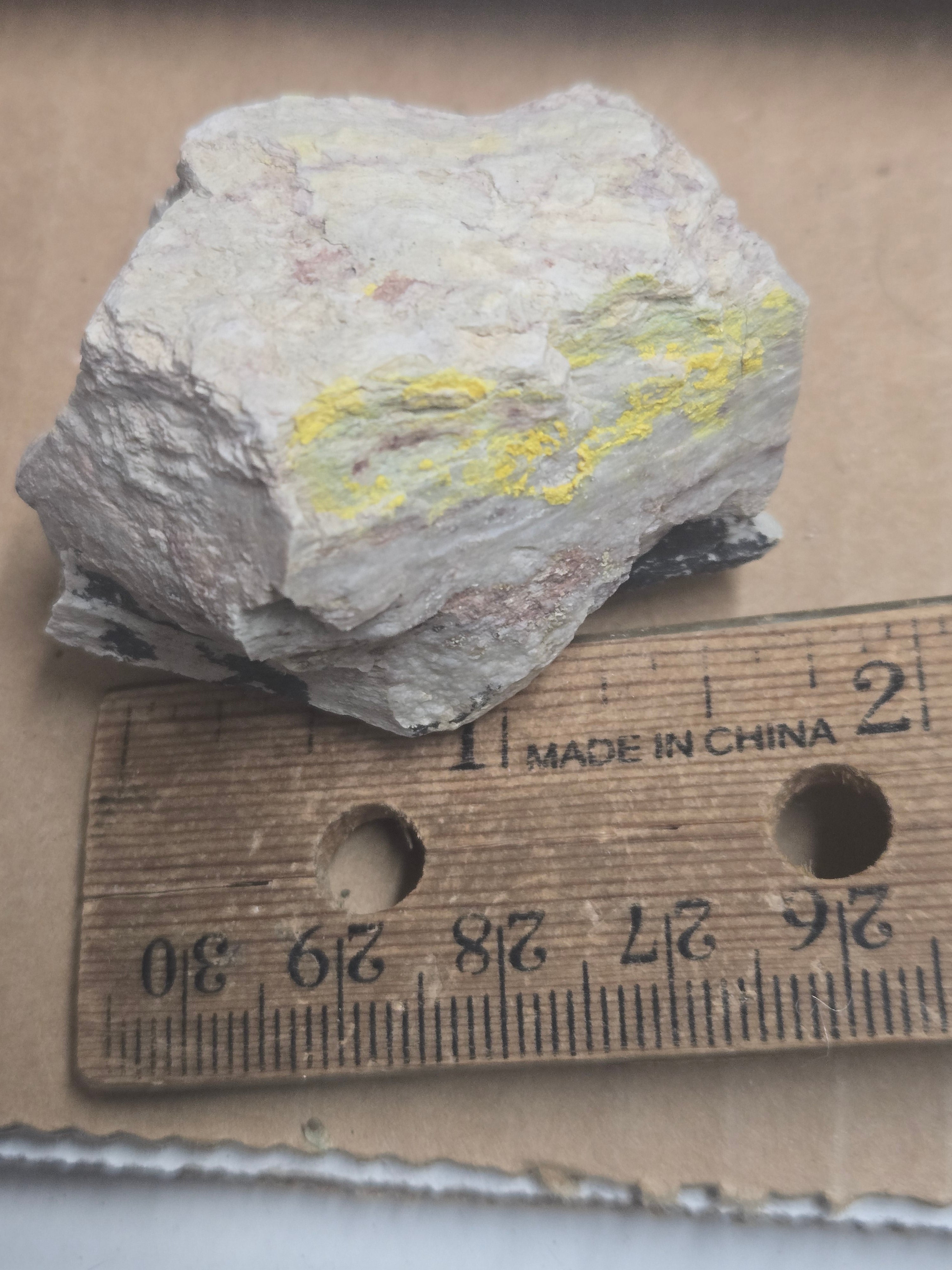 Carnotite weeksite specimen