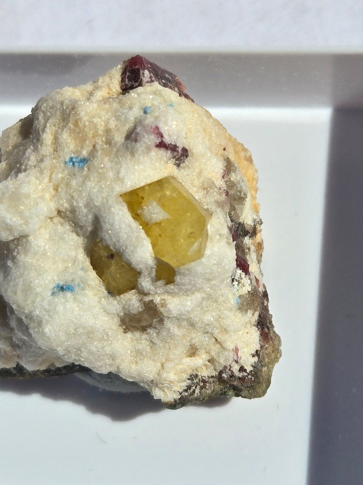 Rhodizite with tourmaline