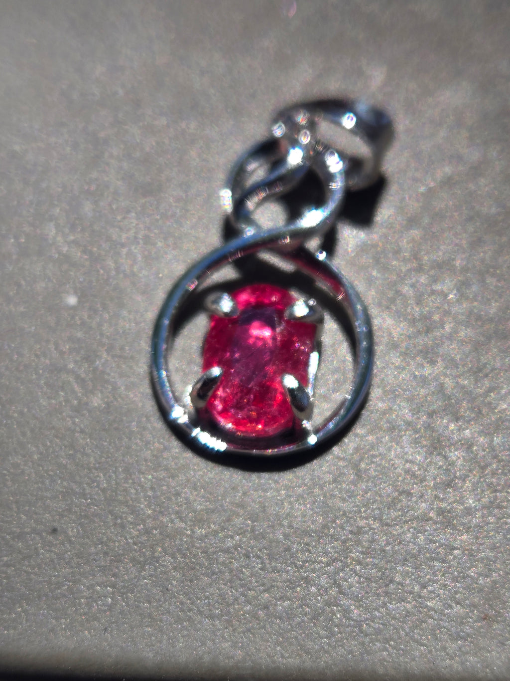 Pink sapphire infinity pendant