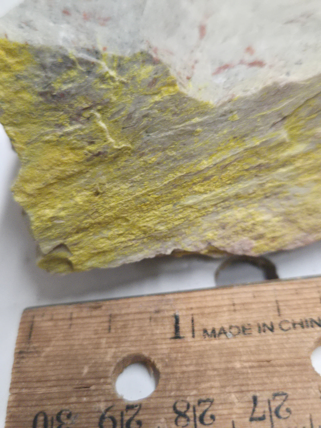 Carnotite weeksite specimen