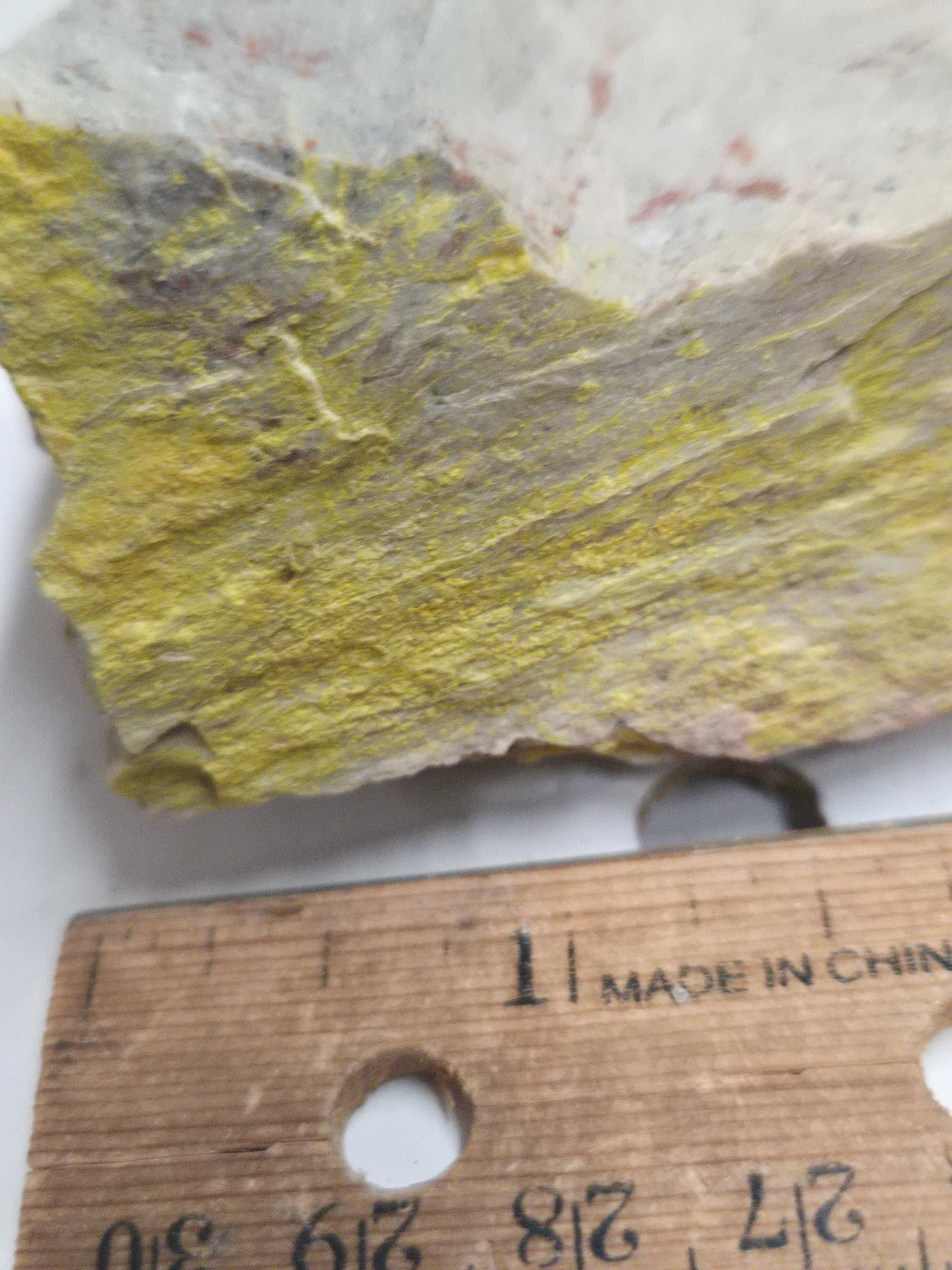 Carnotite weeksite specimen