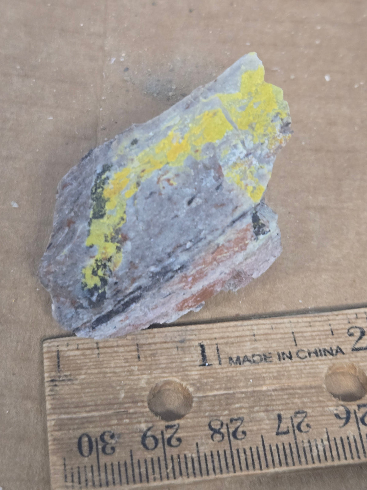 Carnotite weeksite specimen
