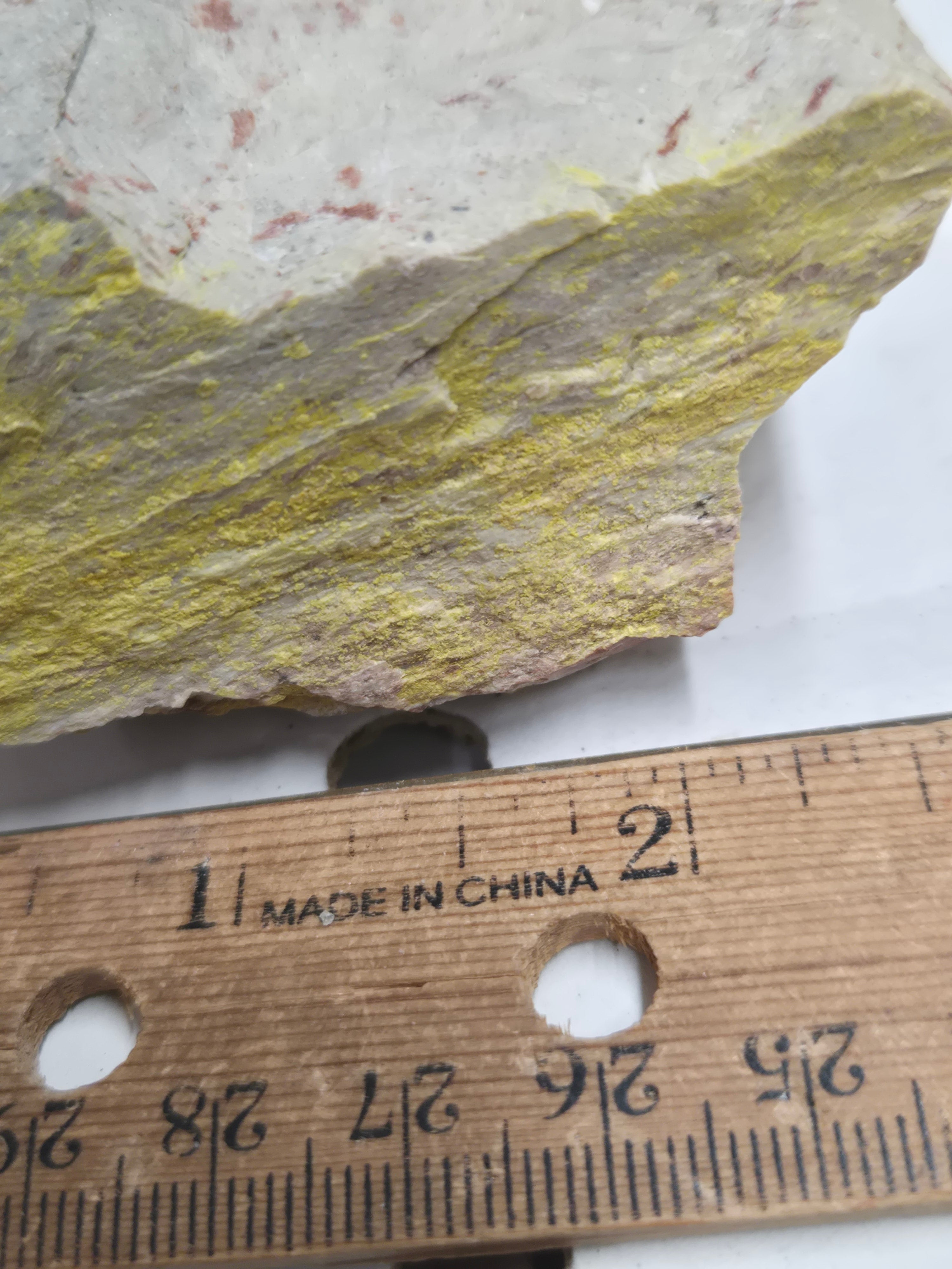 Carnotite weeksite specimen