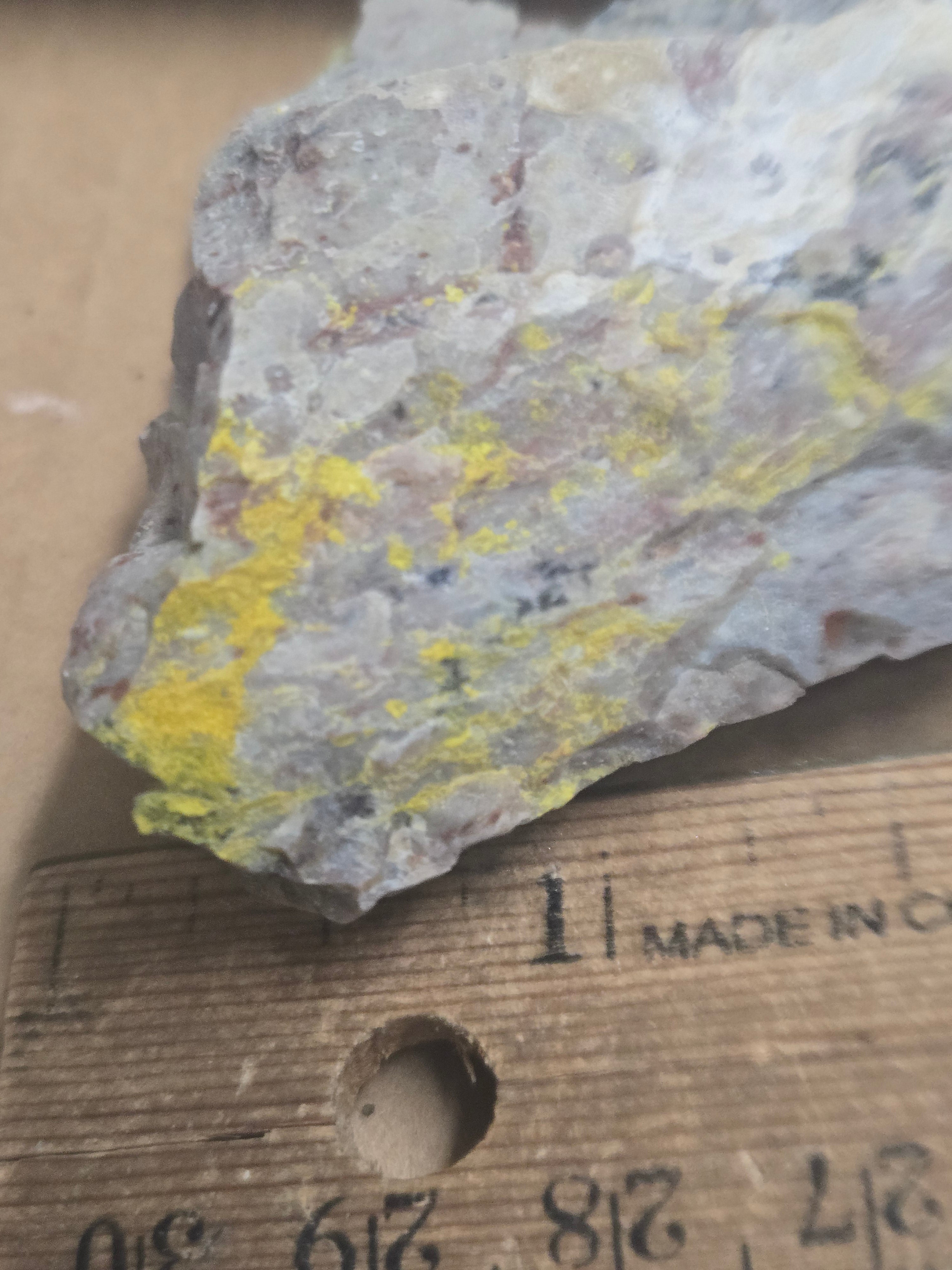 Carnotite weeksite specimen