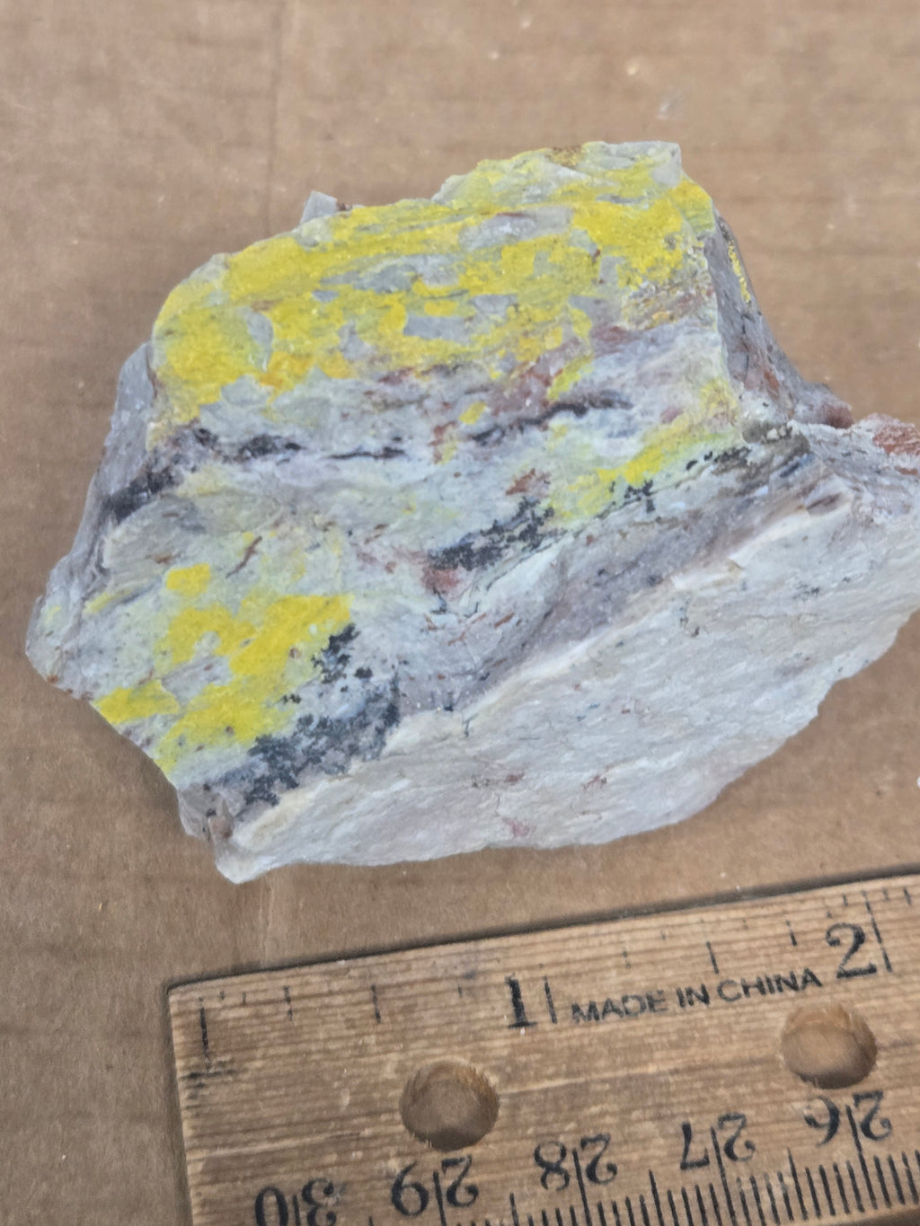 Carnotite weeksite specimen