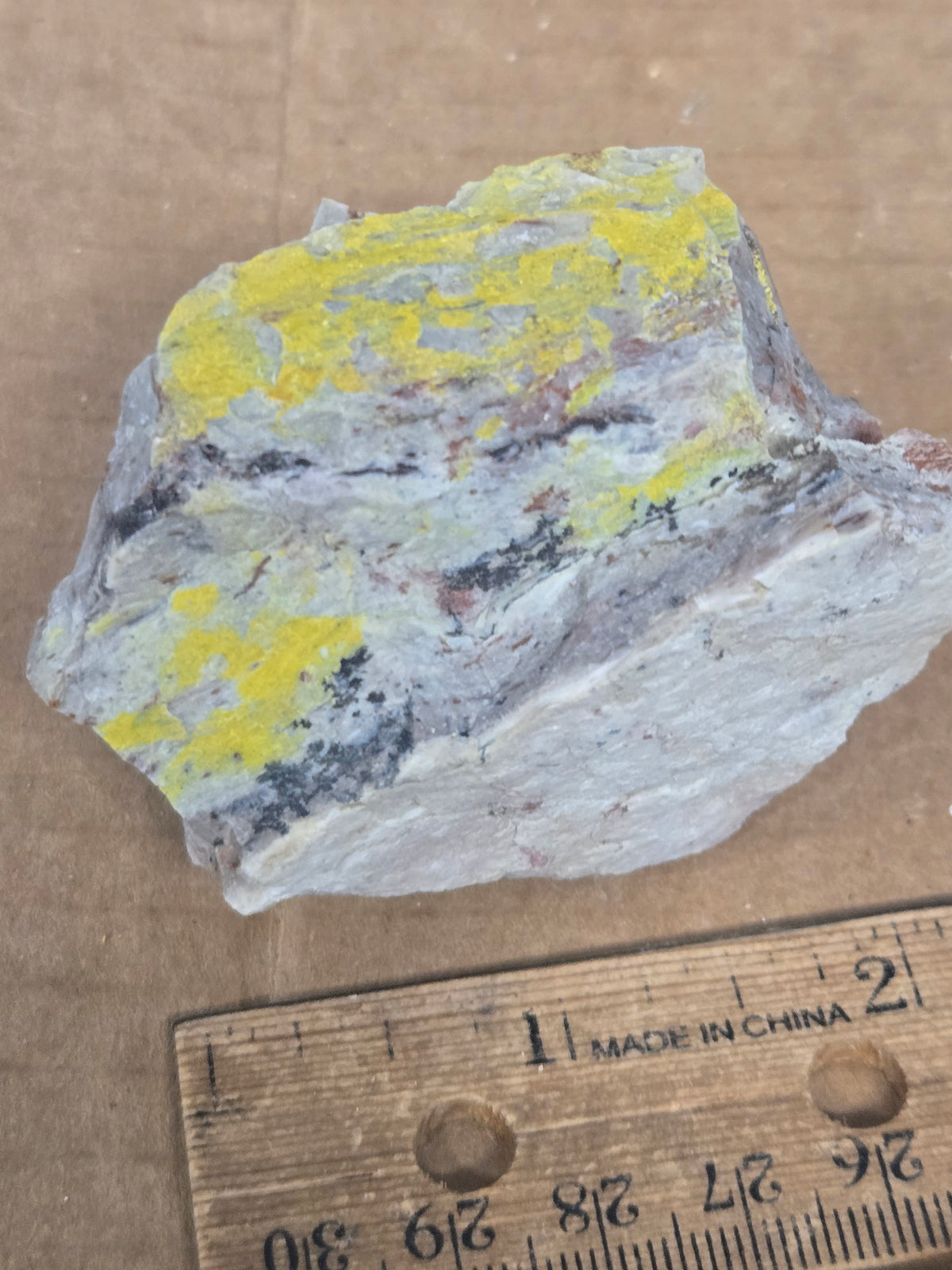 Carnotite weeksite specimen