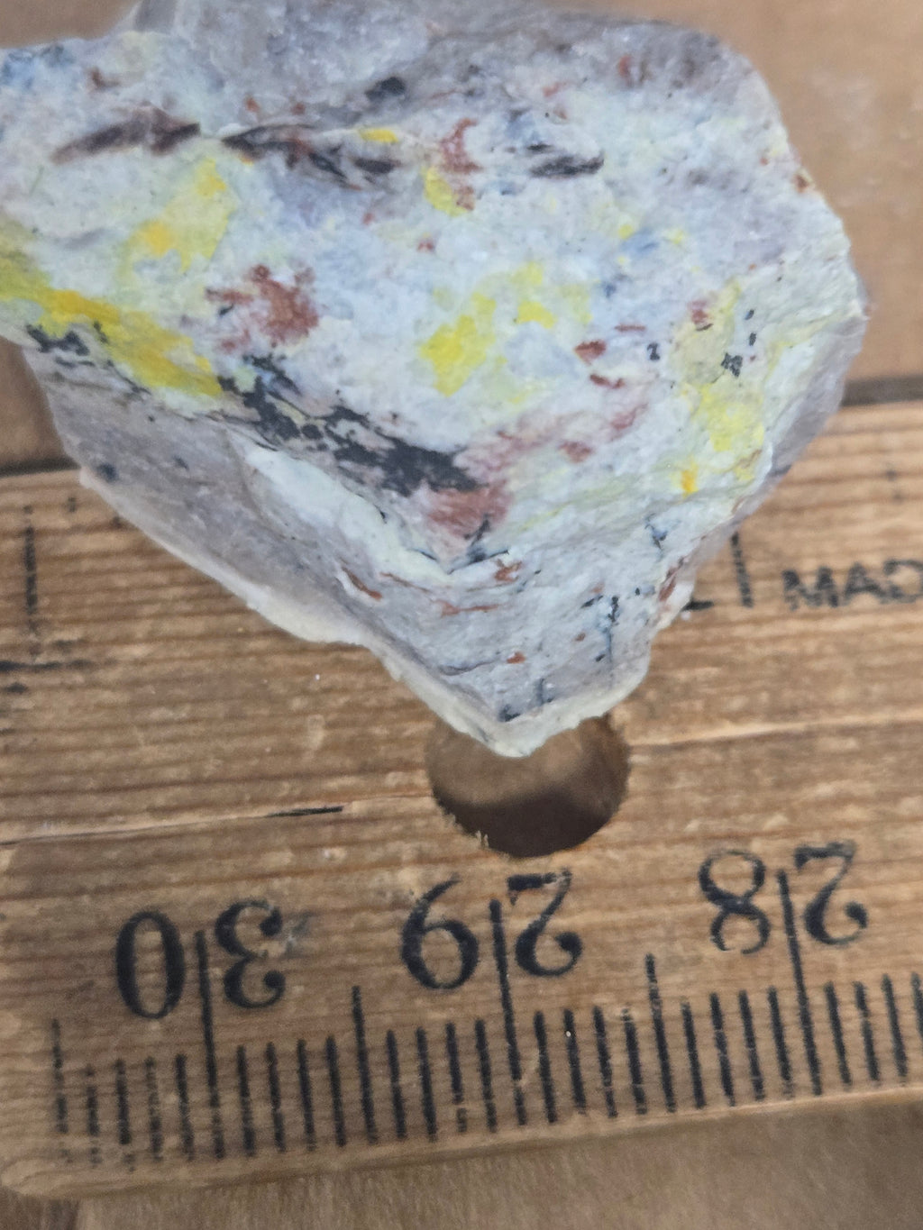 Carnotite weeksite specimen