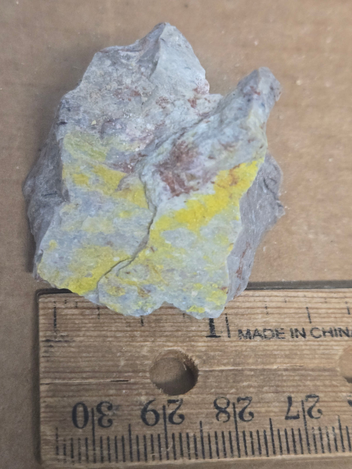 Carnotite weeksite specimen