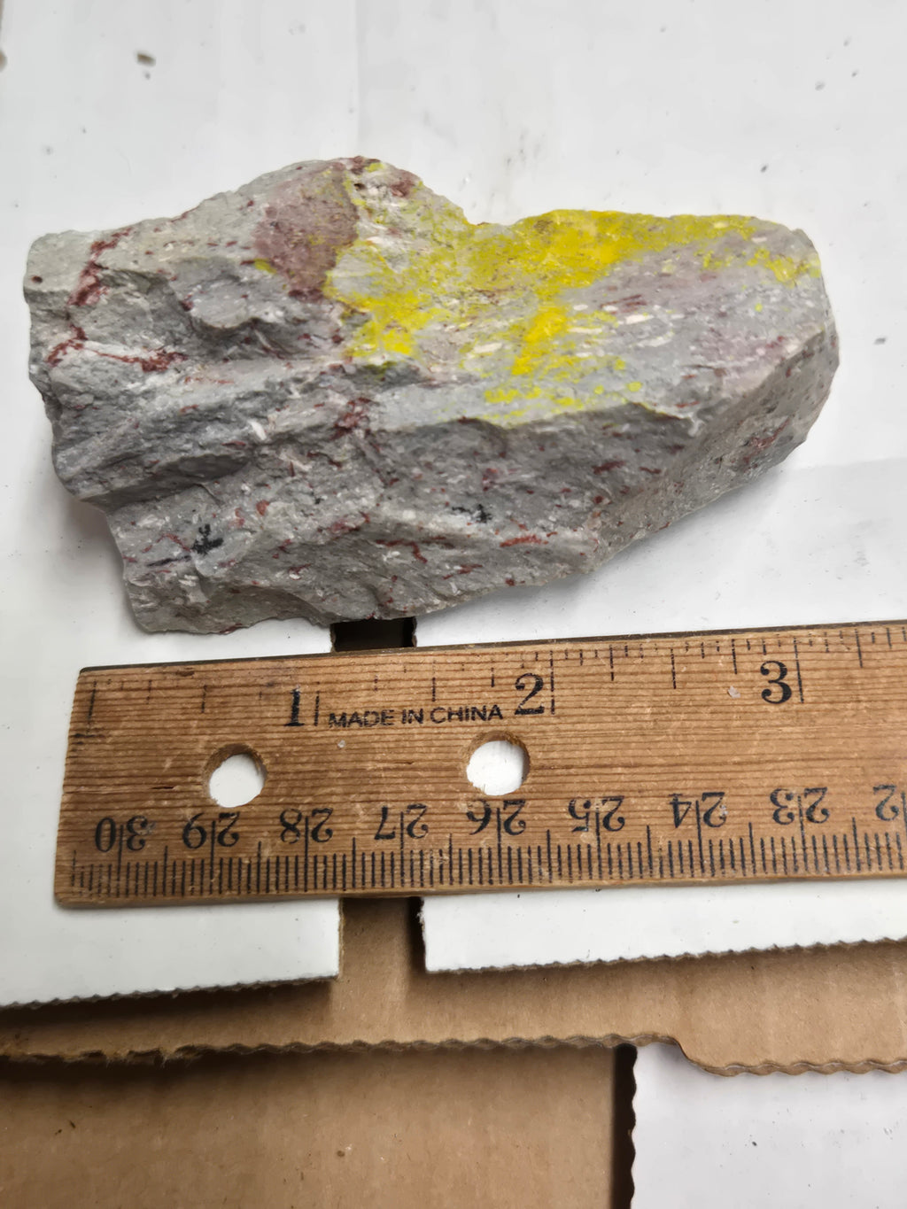 Carnotite weeksite specimen