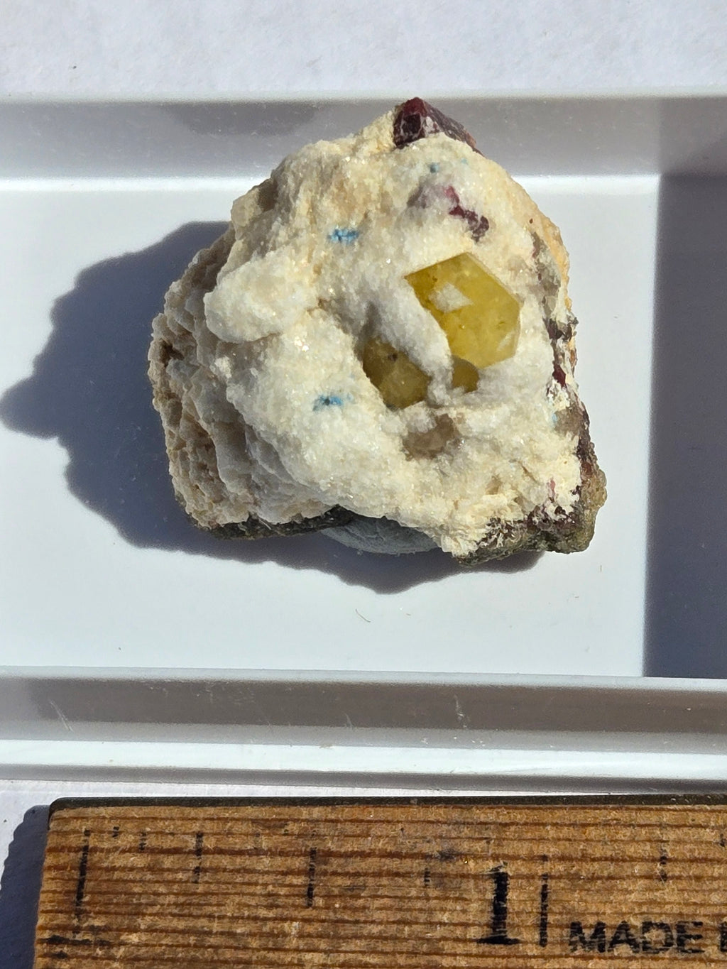 Rhodizite with tourmaline