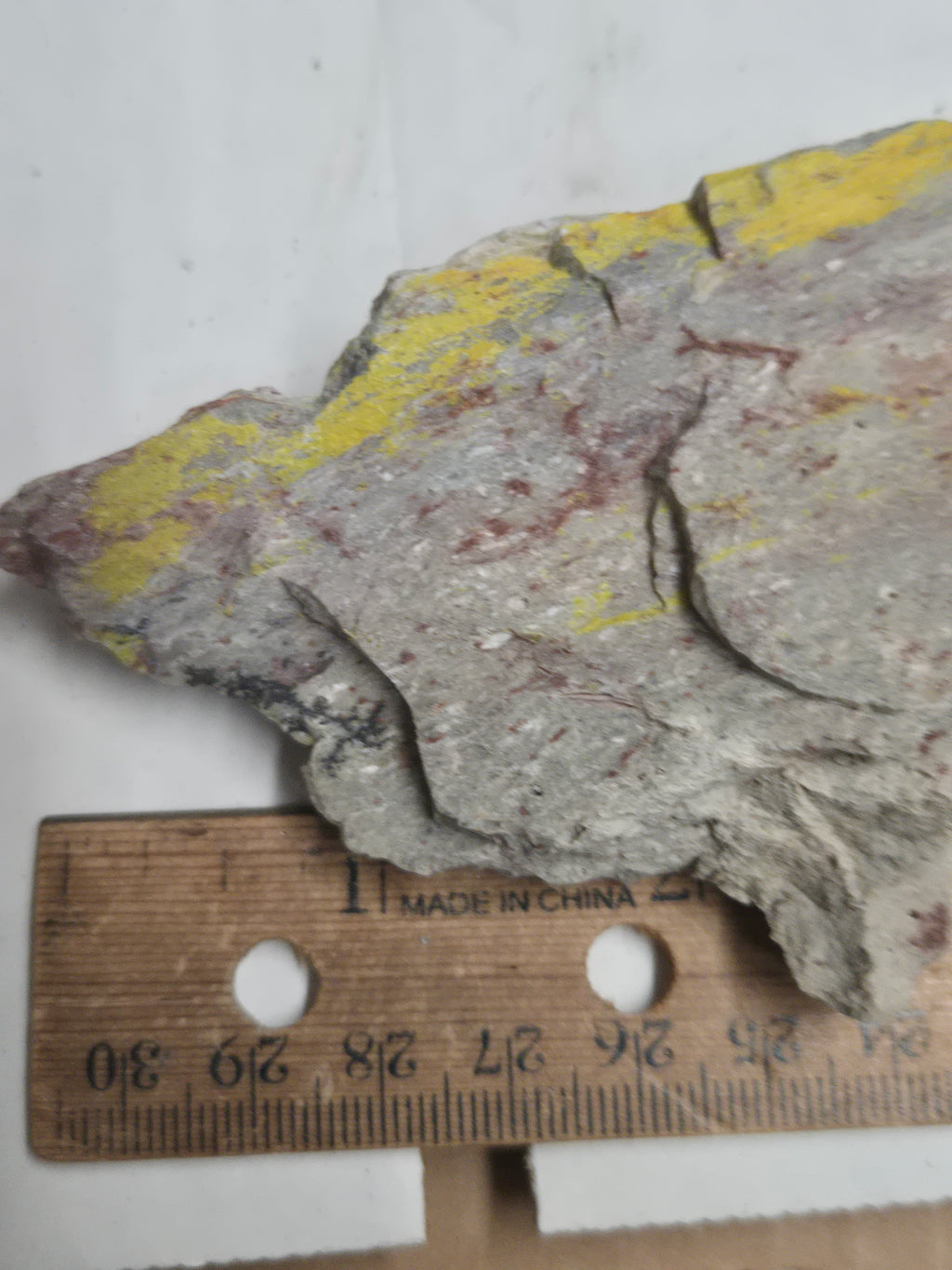 Carnotite weeksite specimen