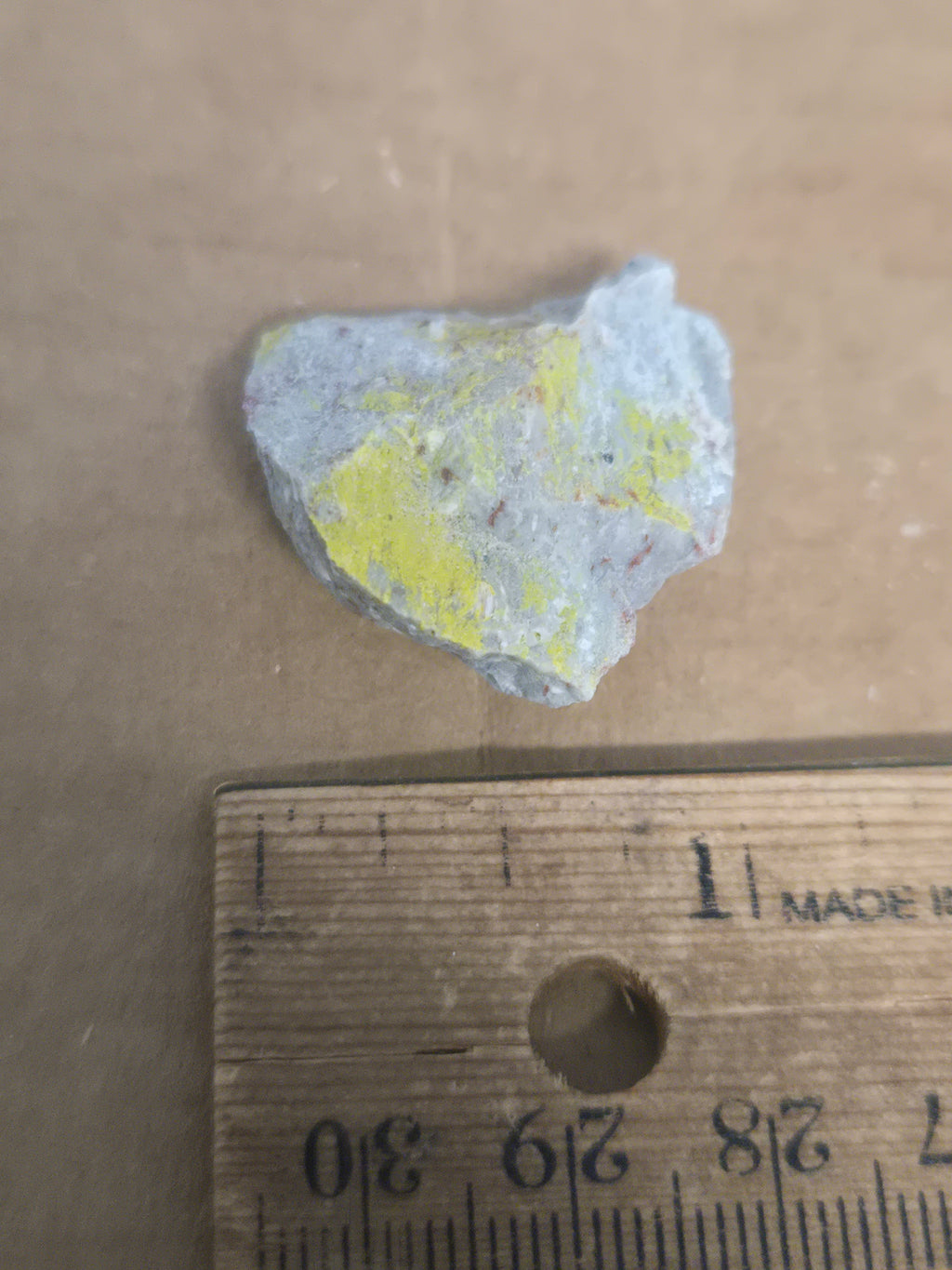 Carnotite weeksite specimen