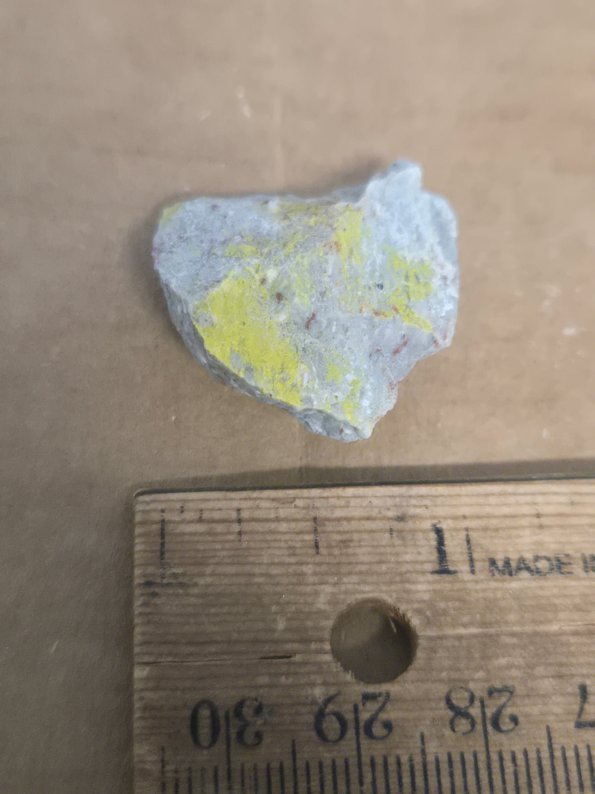 Carnotite weeksite specimen