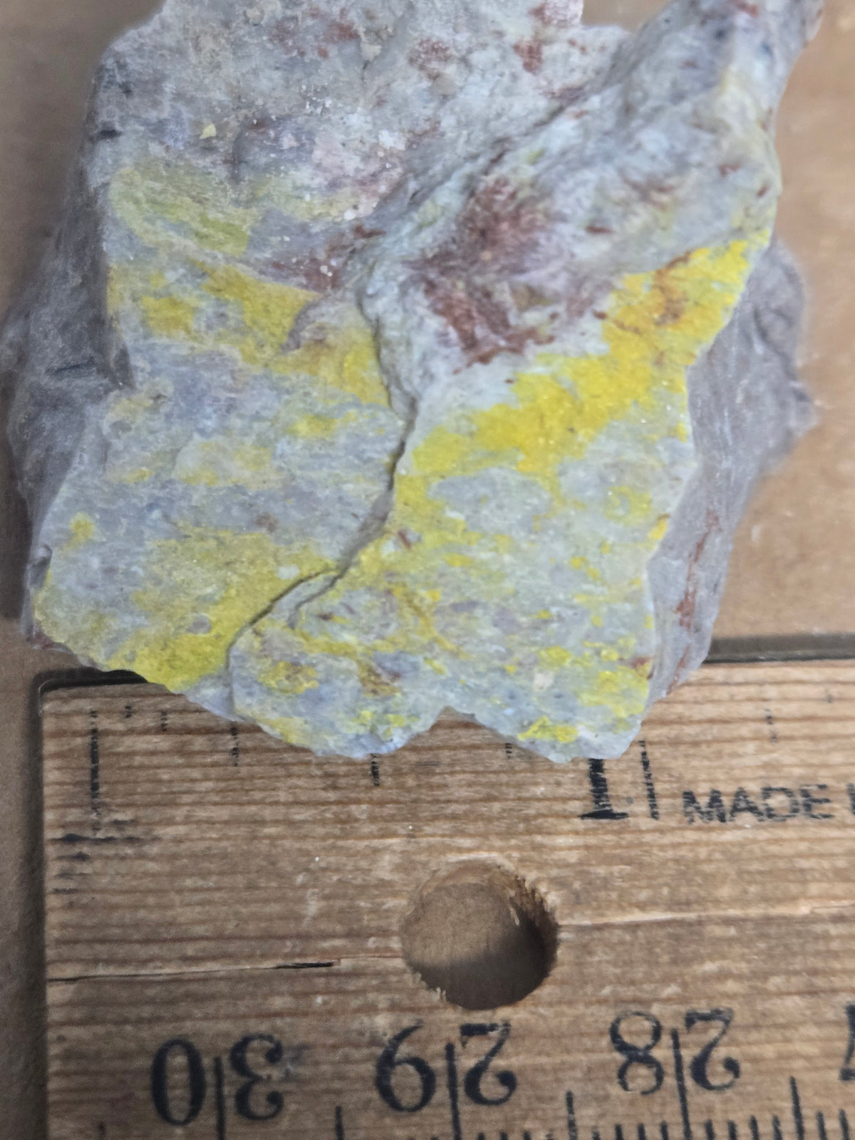 Carnotite weeksite specimen