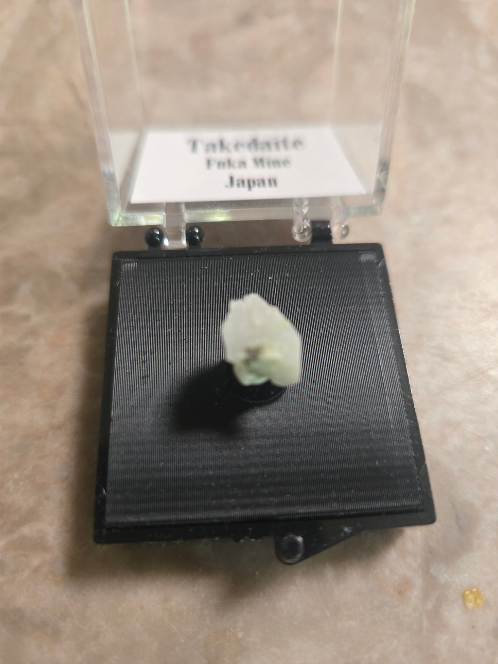 Takedaite