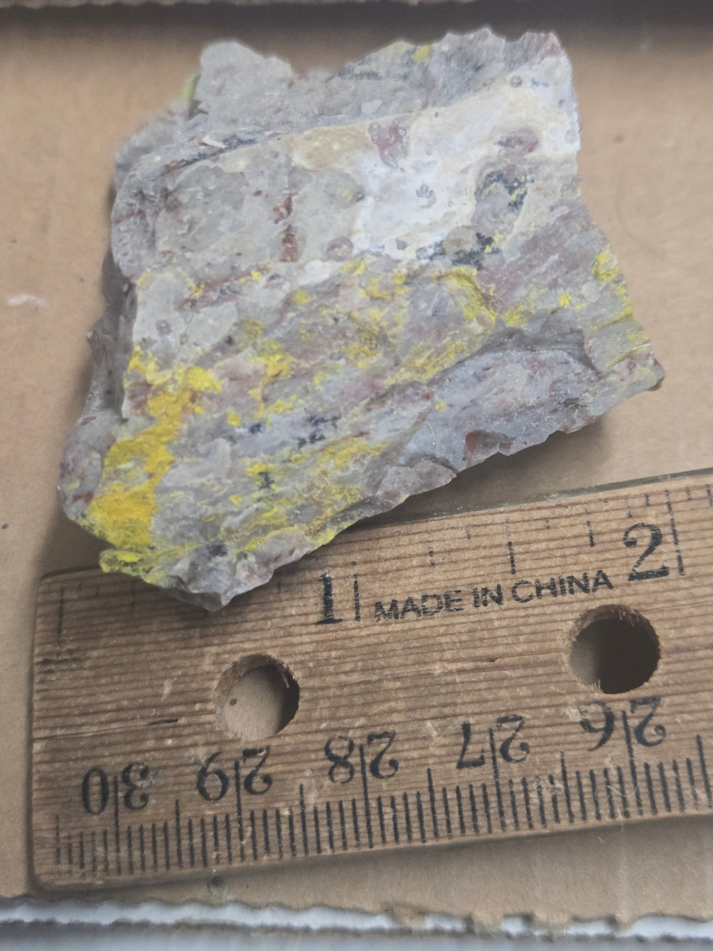 Carnotite weeksite specimen