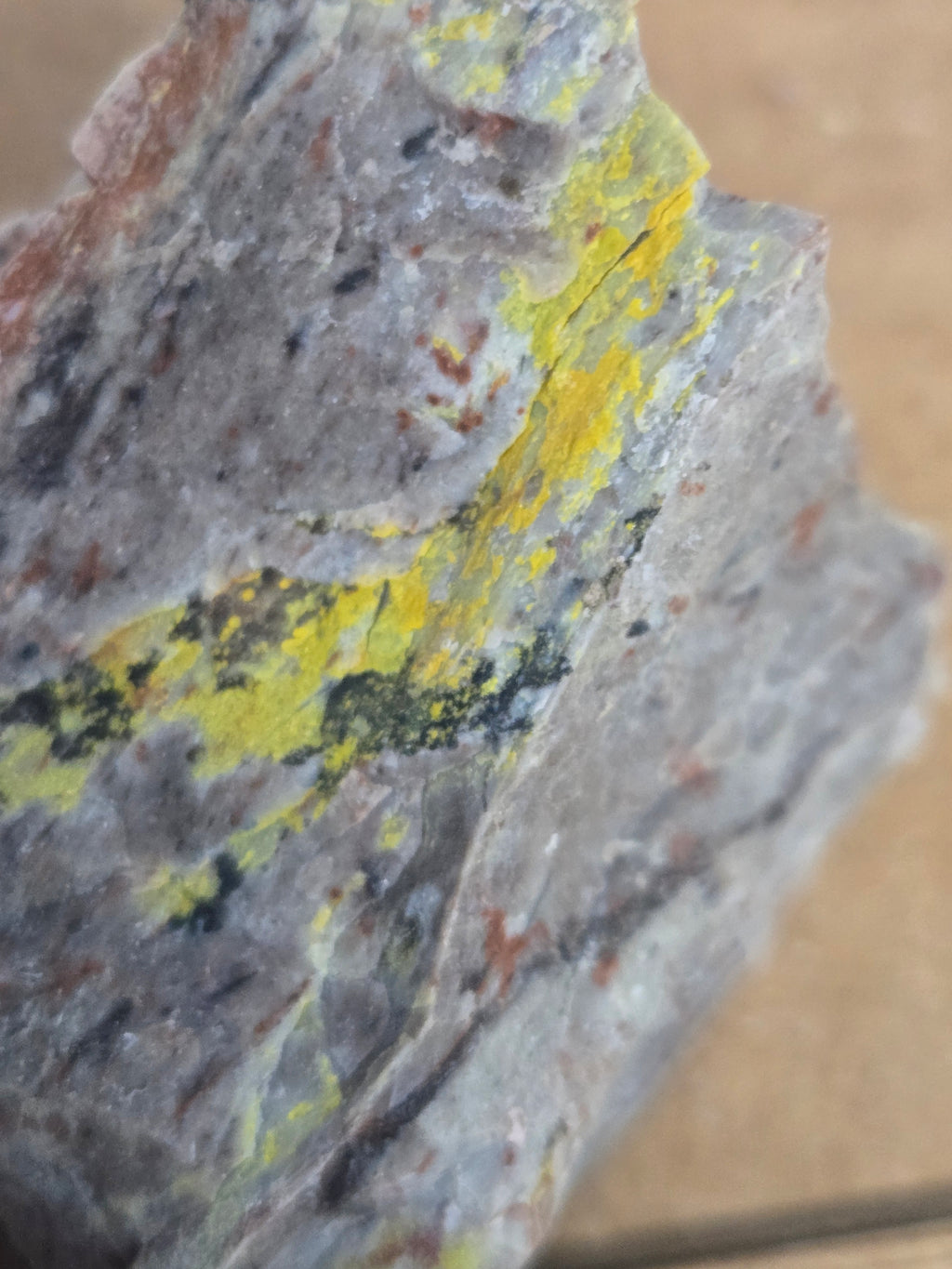 Carnotite weeksite specimen