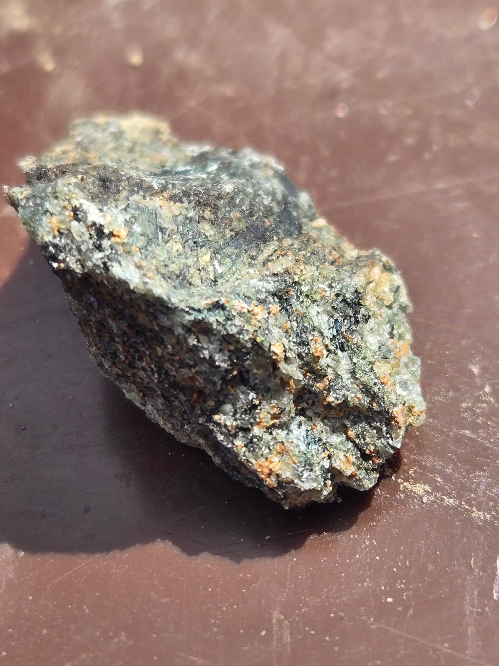 Rosenbuschite with fluoro-leakeite