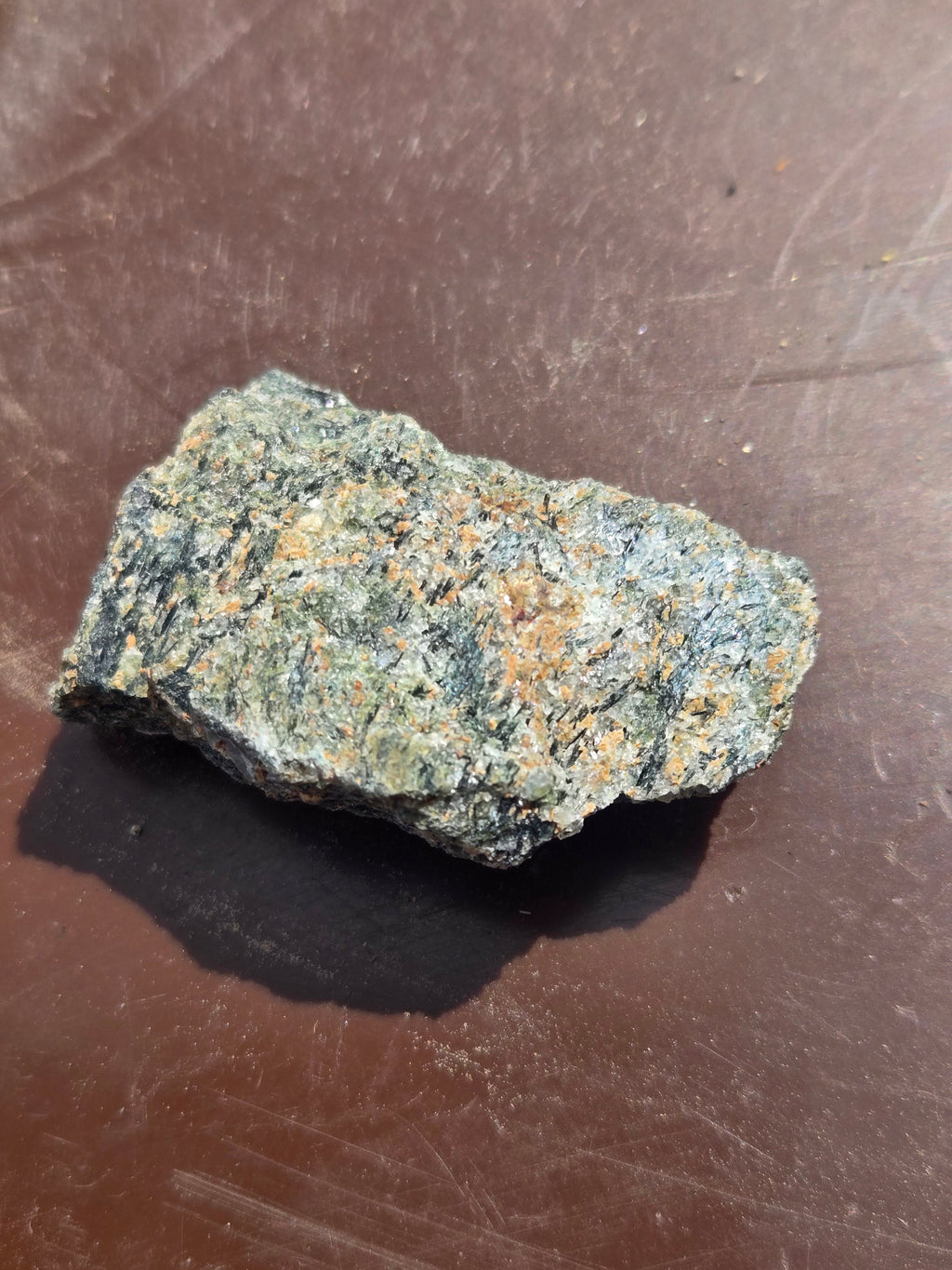 Rosenbuschite with fluoro-leakeite