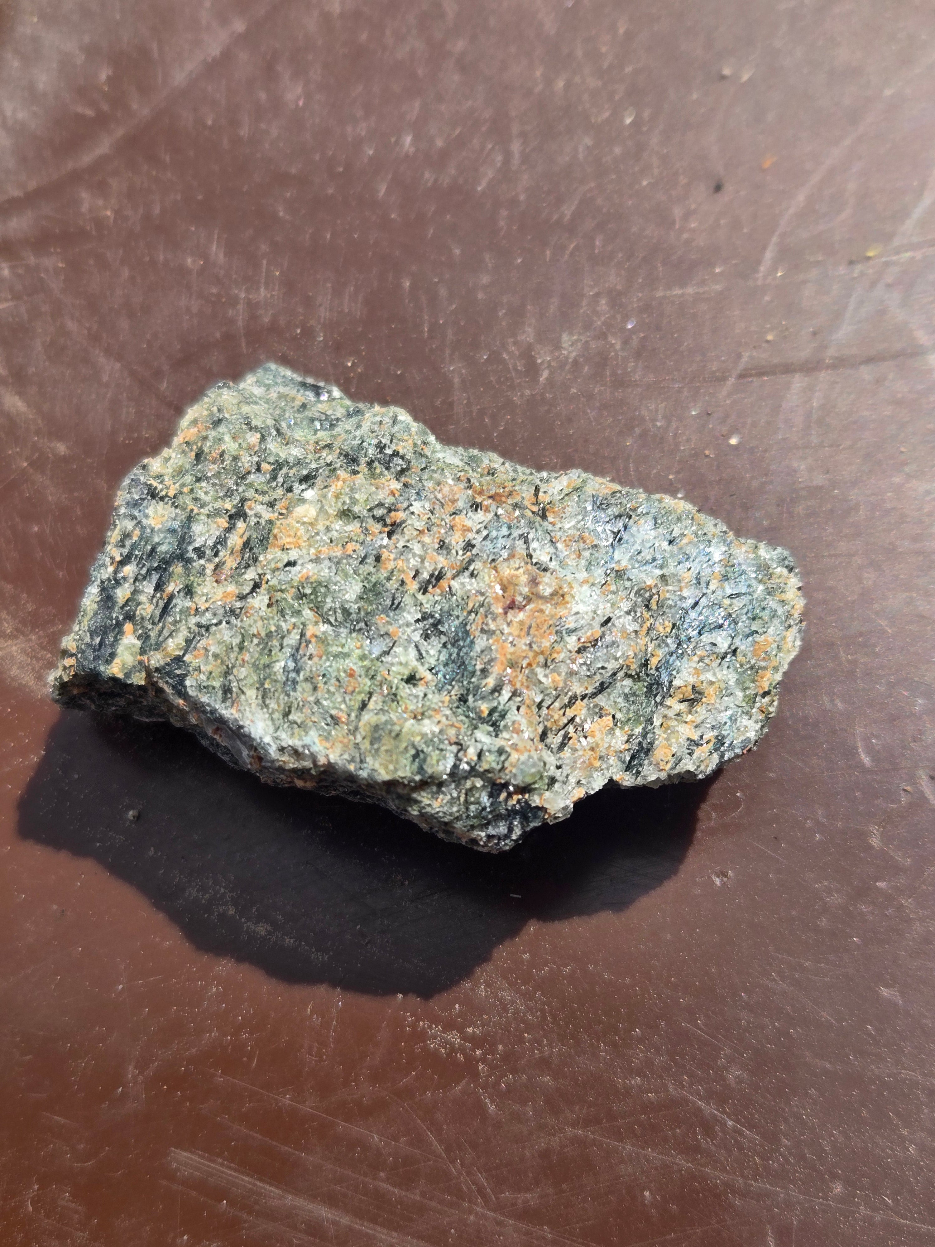 Rosenbuschite with fluoro-leakeite