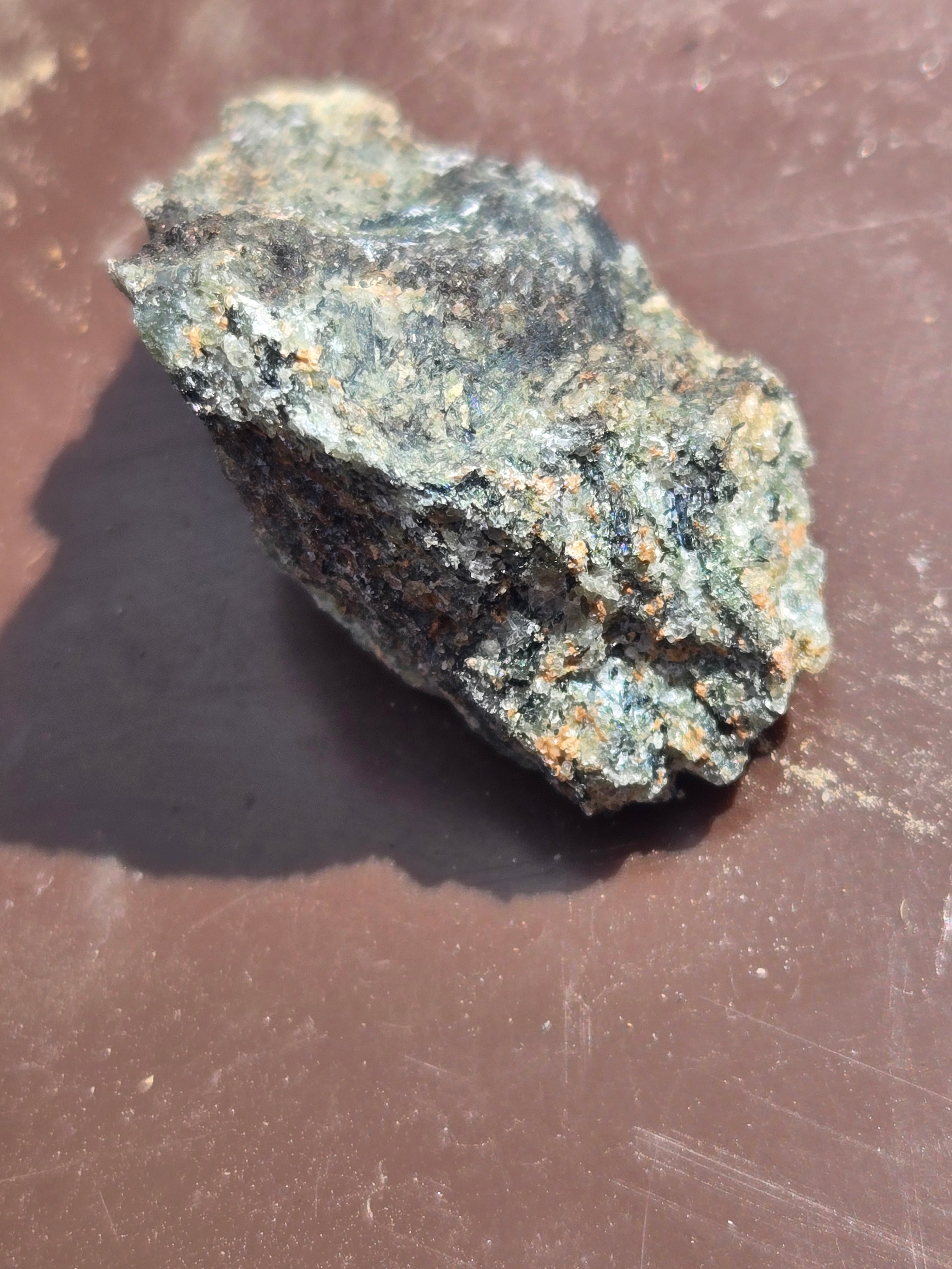Rosenbuschite with fluoro-leakeite