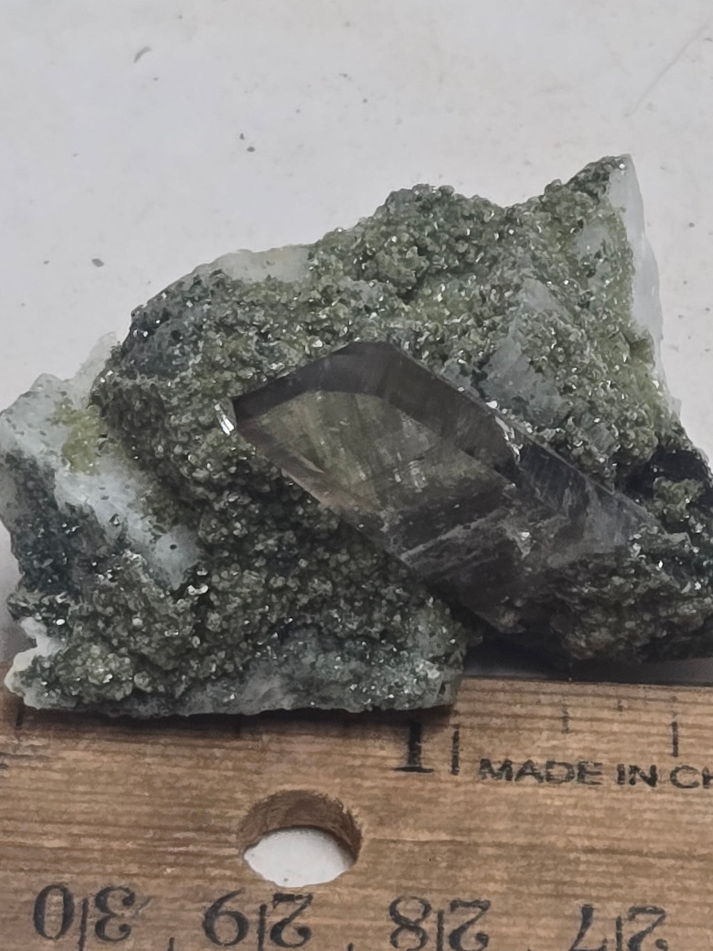 Smoky quartz on Albite