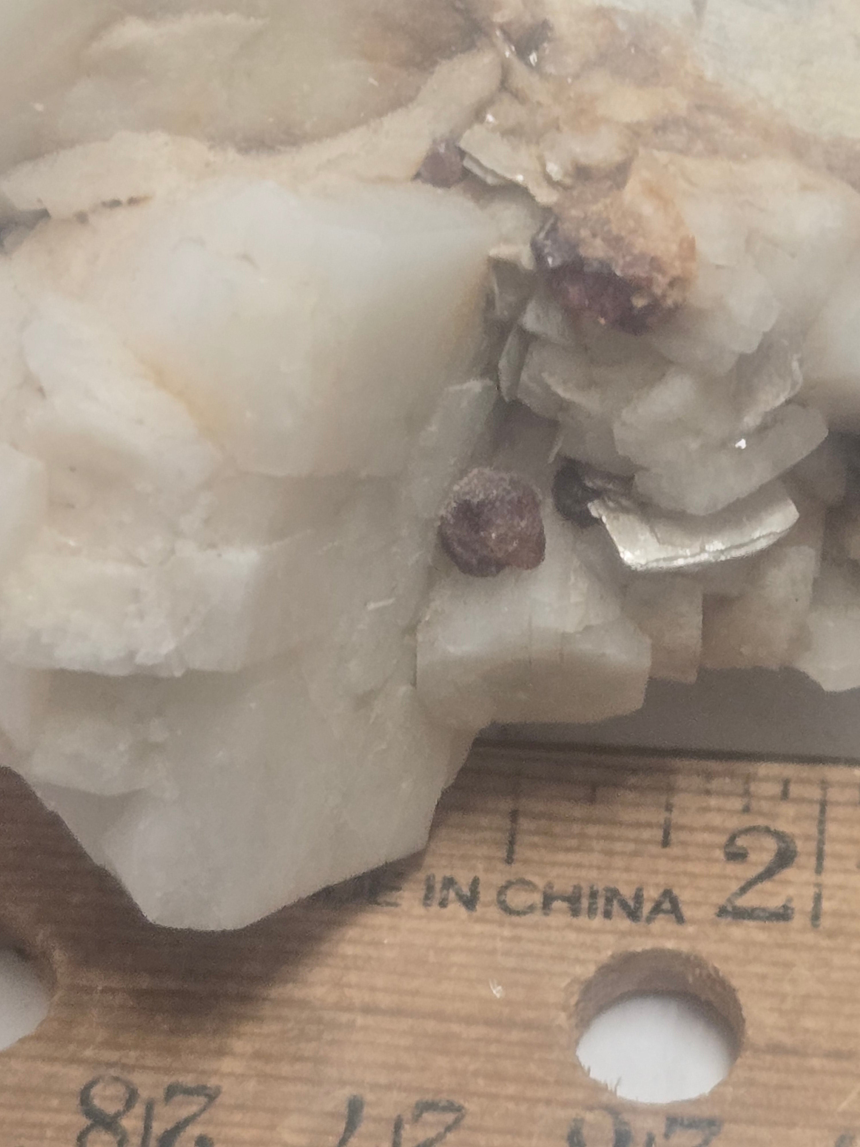 Spessartite on albite