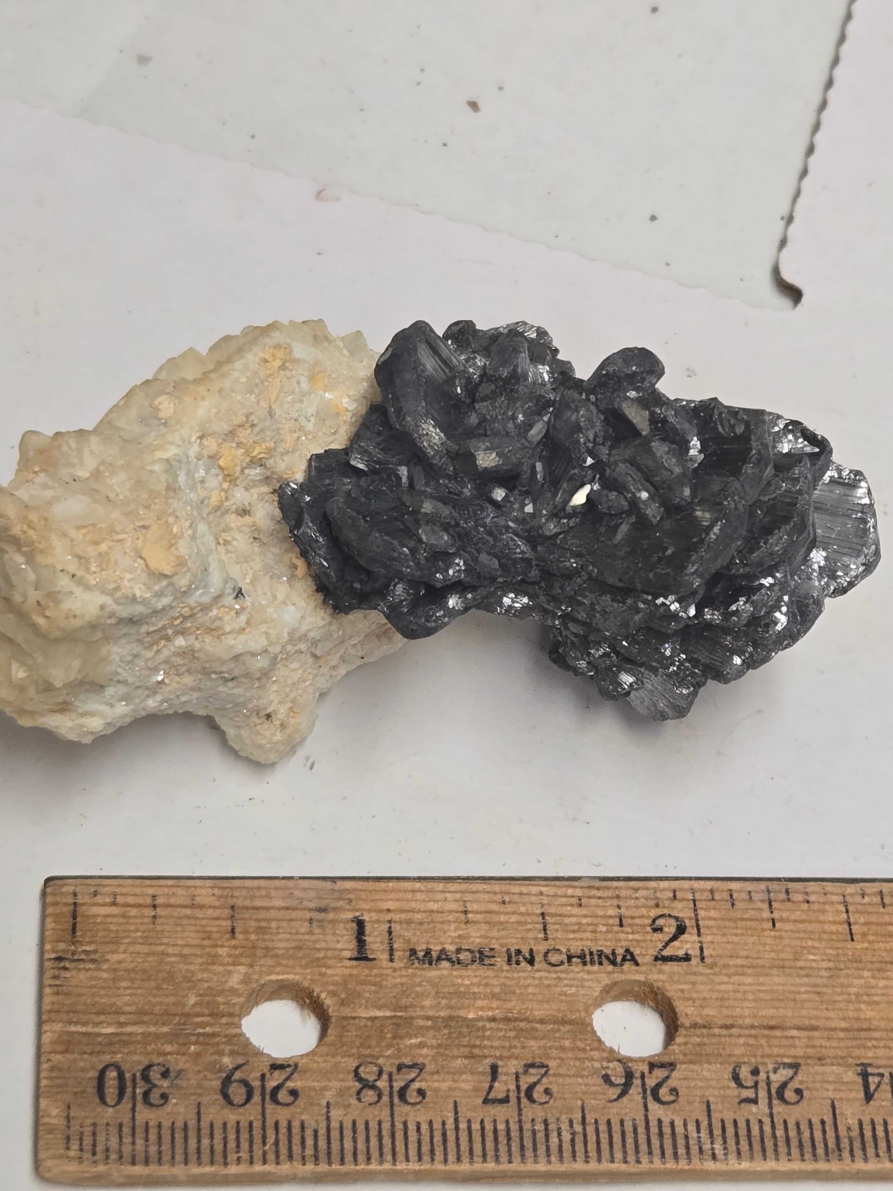 Stibnite on barite