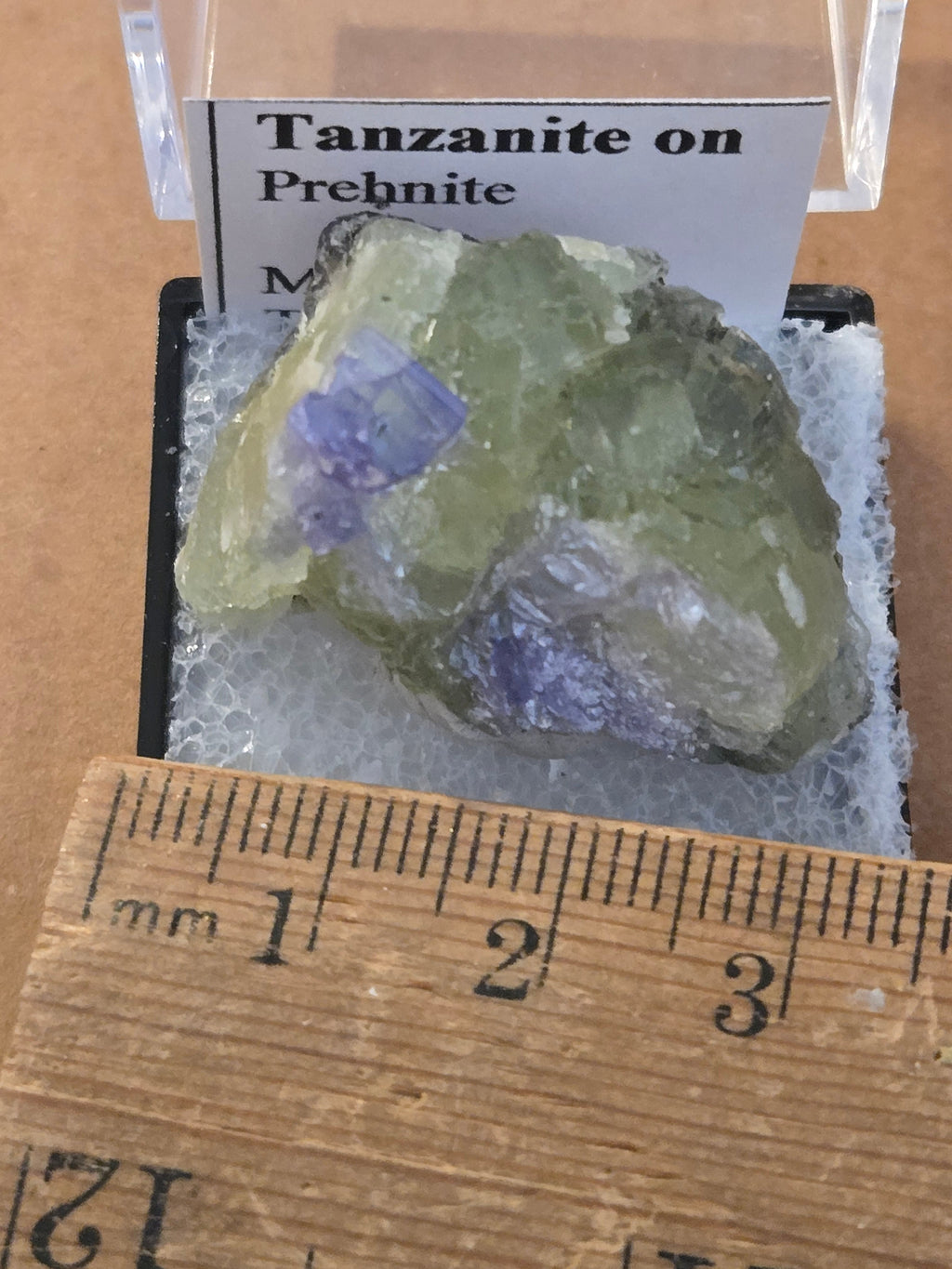 Tanzanite on green prehnite specimen