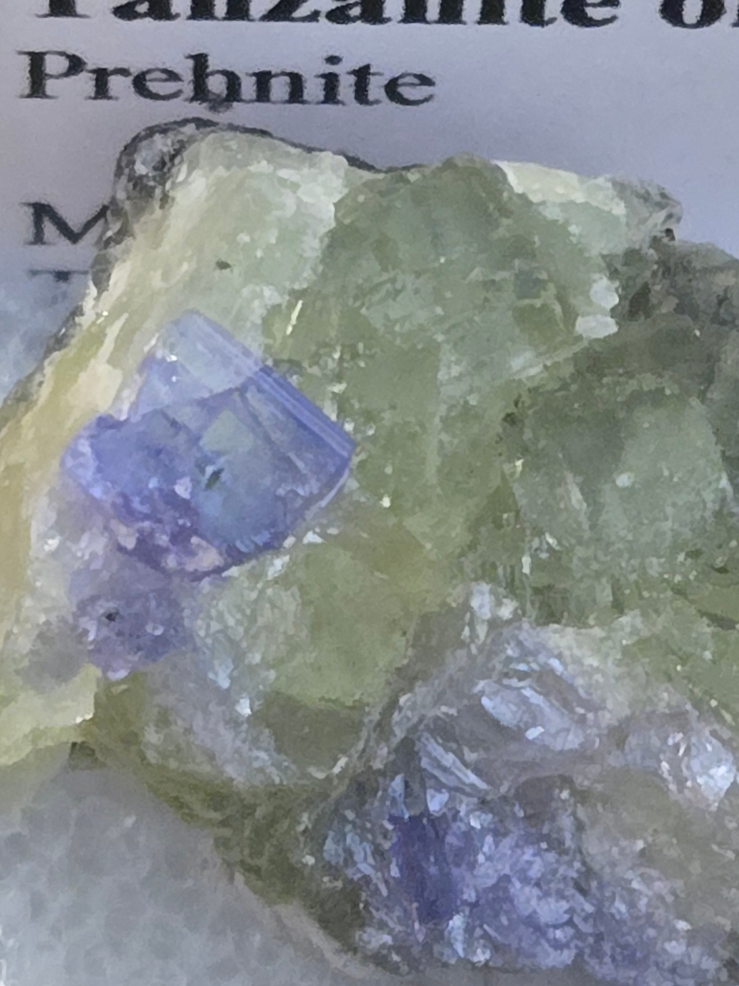 Tanzanite on green prehnite specimen