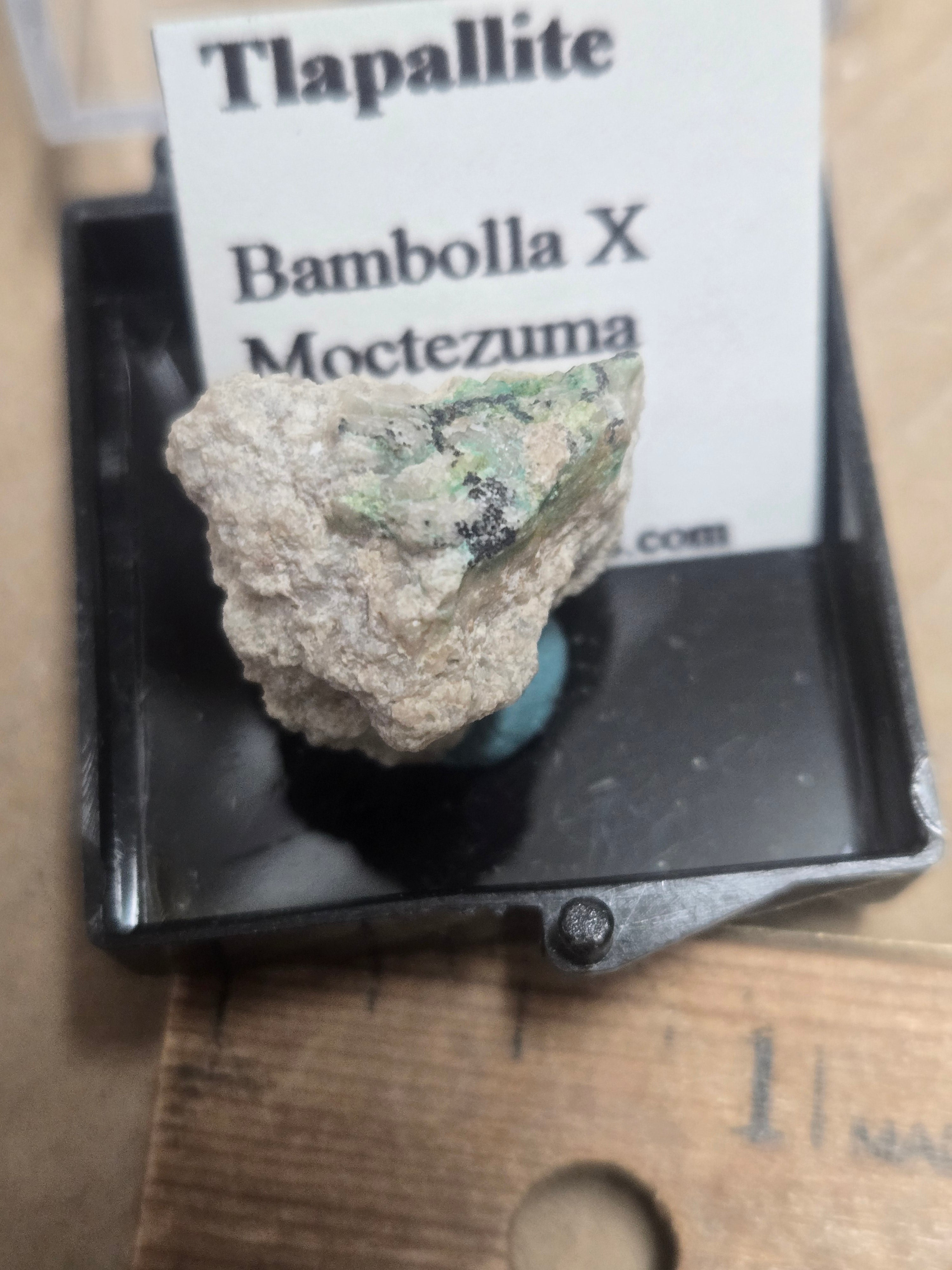 Tlapallite