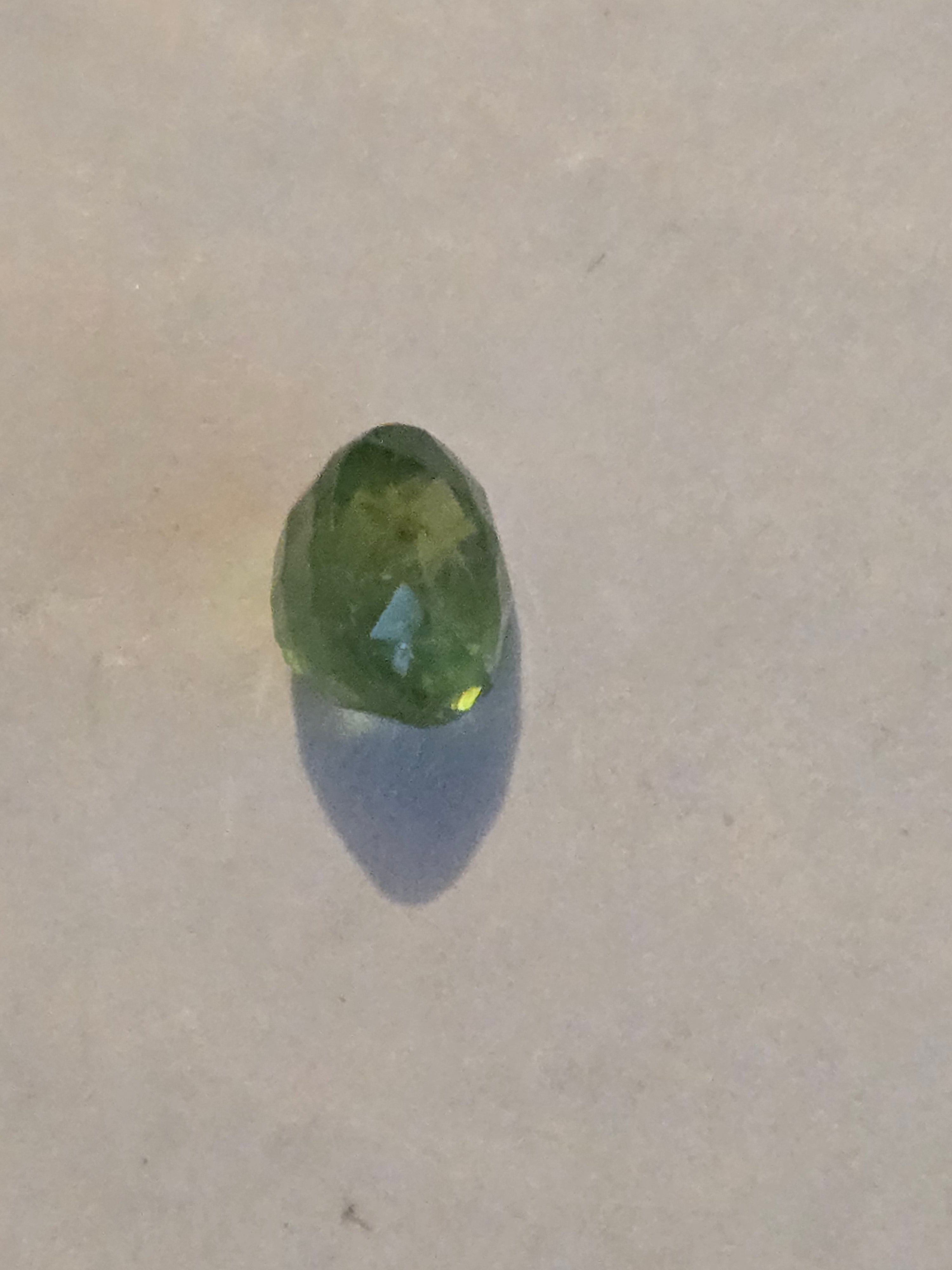 Tsavorite garnet facet