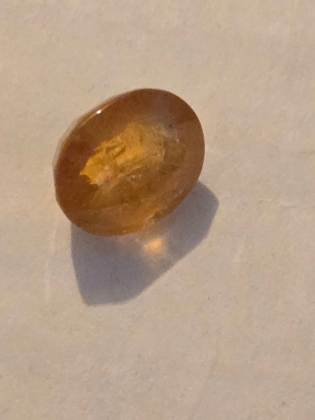Yellow sapphire facet