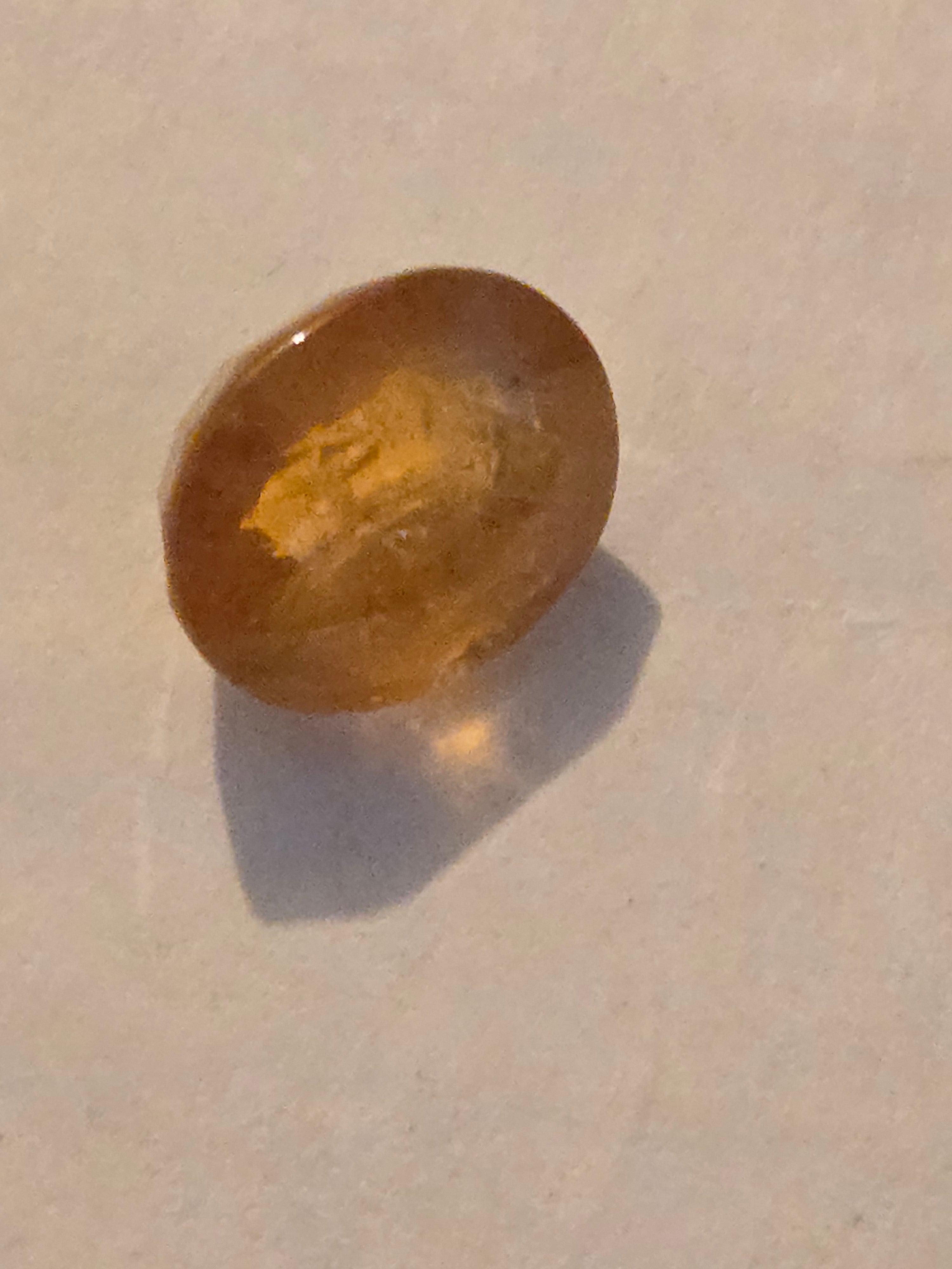 Yellow sapphire facet