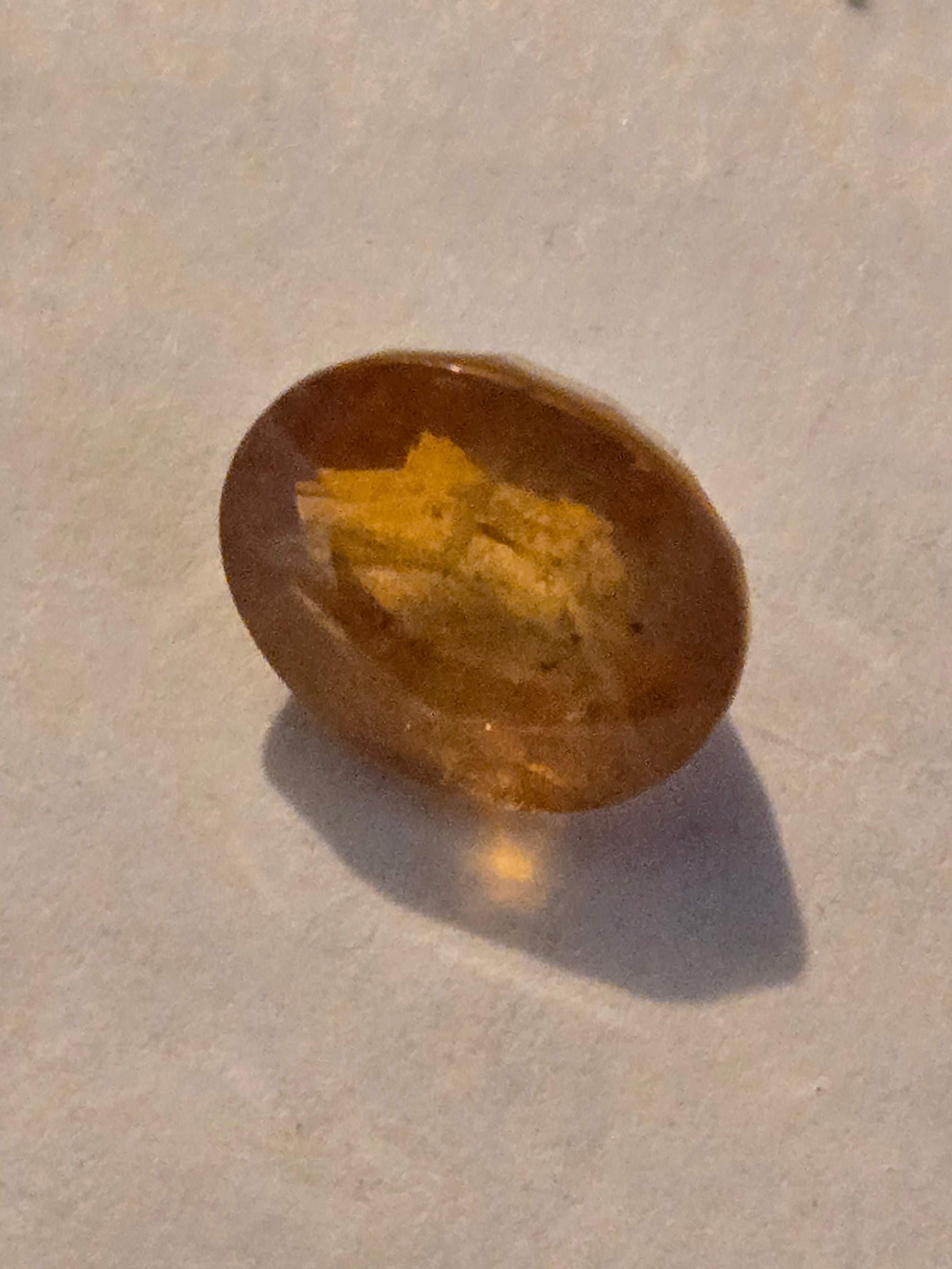 Yellow sapphire facet